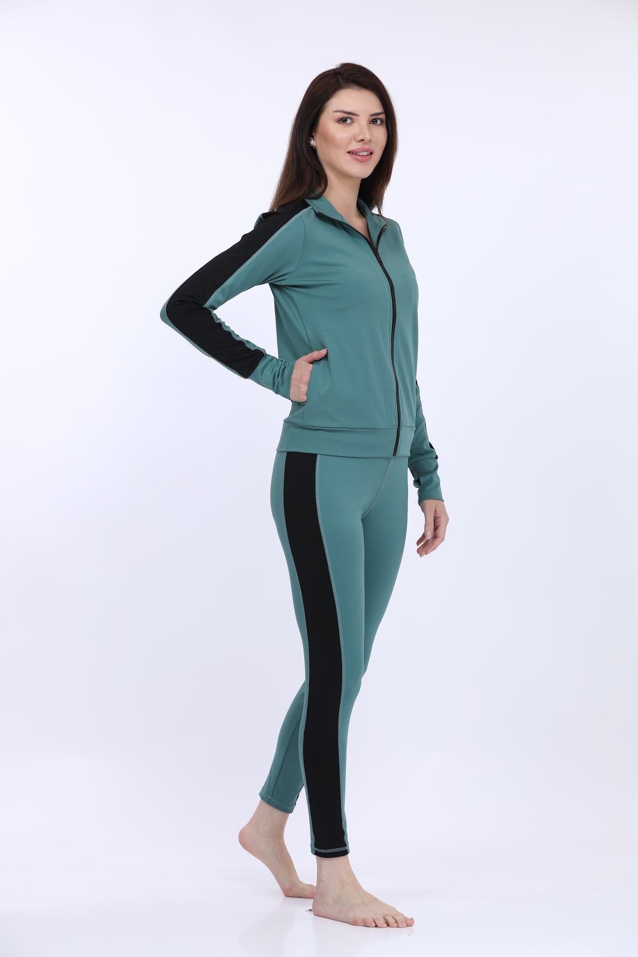 Women Poly Spandex Green Solid Full Sleeve Track Suit